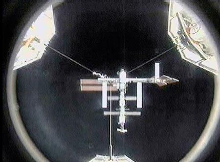 The International Space Station is seen in from Atlantis' docking port in this view from NASA TV June 10, 2007. The crew on the Atlantis will deliver a new segment to the ISS during the 11-day planned mission.