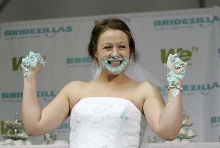 Stephanie Florio reacts after winning the WE tv network's 'Bridezilla-Ultimate Cake Eating Contest' in New York's Times Square June 12, 2007. The cable channel gave away a $25,000 prize to kick off the fourth season of their 'Bridezillas' series.