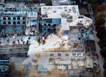 An aerial view of the Red Mosque (top) and the Jamia Hafsa seminary during Operation Silence by Pakistani special forces in Islamabad July 10, 2007. Pakistani forces stormed a mosque compound on Tuesday, killing about 50 militants, as they fought their way through an Islamic school were they believed a rebel cleric was hiding with women and children hostages.