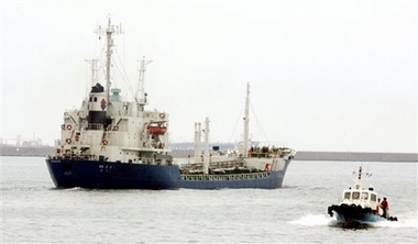 A South Korean ship, Han Chang, left, carrying heavy oil leaves for North Korea at a port in Ulsan, southeast of Seoul, South Korea, Thursday, July 12, 2007. 