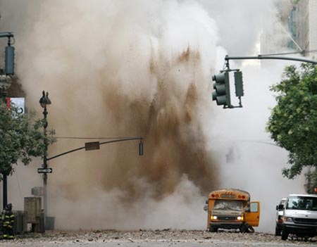 Steam, smoke and mud erupt from the center of 41st street after an explosion near Grand Central Station in New York, July 18, 2007. A transformer exploded in midtown Manhattan on Wednesday, creating a roar and a huge plume of smoke and sending pedestrians fleeing from the area in scenes reminiscent of the Sept. 11 attacks. 