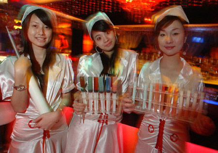 Bartender girls in nurse outfits