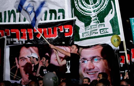 Israeli PM Olmert faces down protests 