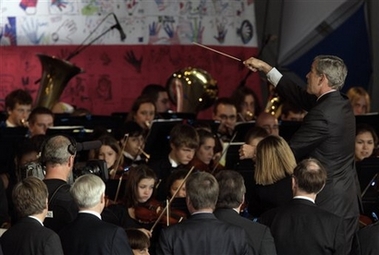 Bush conducts and impresses orchestra