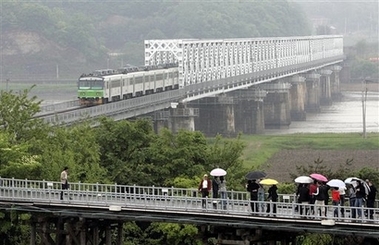 Trains depart for journey through Koreas