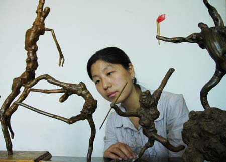 Tree-root carvings for Beijing Olympic Games