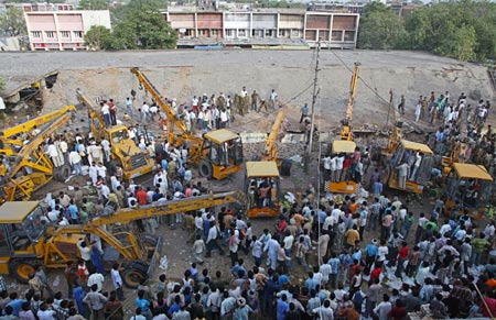Dozens trapped as concrete roof collapses on market