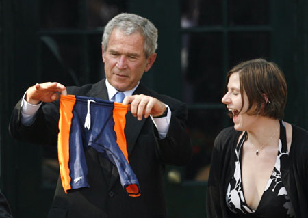 Bush presented with swimsuit