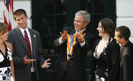 Bush presented with swimsuit