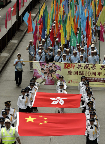 Paraders mark anniversary of Hong Kong's return