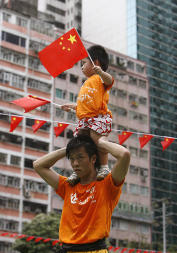 Paraders mark anniversary of Hong Kong's return