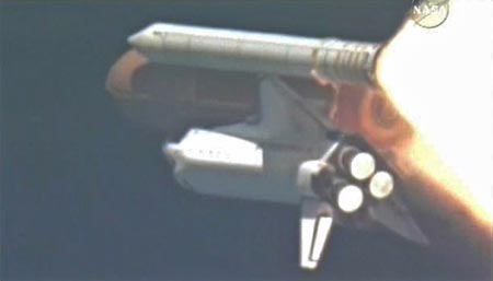 The Space Shuttle Endeavour climbs to space in this view from a television tracking camera captured from NASA TV August 8, 2007.