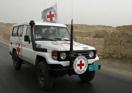 Two South Korean female hostages are escorted after their release in Arzoo of Ghazni province, southwest of Kabul August 13, 2007. Two South Korean women held hostage by the Taliban for more than three weeks in Afghanistan were freed on Monday and handed over to Korean officials in relatively good health. 