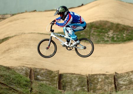 Donny Robinson, of the United States, rides over the course during the UCI BMX Supercross World Cup at Laoshan Bicycle Moto Cross (BMX) venue in Beijing August 21, 2007. Donny Robinson won the gold medal in the final of the UCI BMX Supercross World Cup.[Xinhua]