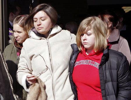 NIU students leave a memorial service for the victims of the Northern Illinois University shooting at the Newman Catholic Student Center in DeKalb, Illinois February 15, 2008. Former student Stephen Kazmierczak, 27, killed five students and himself and wounded 21 others during a lecture at the university on February 14. [Agencies]