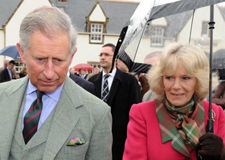 Britain&apos;s Prince Charles (L) and Camilla, Duchess of Cornwall, are in Banffshire to open the new head office of Walkers Shortbread at Aberlour House in Scotland April 9, 2008.