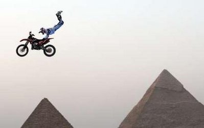 Bikers show stunt skills at Giza pyramids