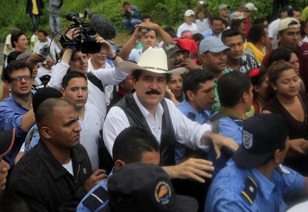 Zelaya's brief return sparks clashes in Honduras