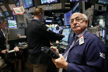 Dow closes above 10,000 for 1st time in a year