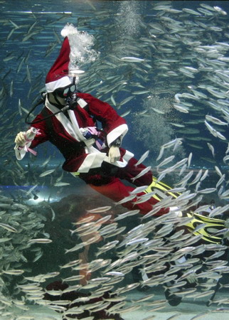 Underwater Santa Claus performs in Seoul