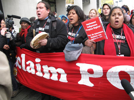 Protesters march outside Copenhagen summit venue