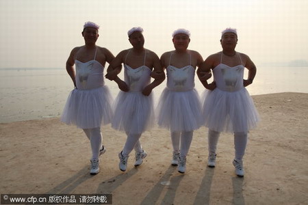 Crossdressing men perform ballet for wetlands