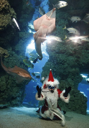 Santa Claus around the world ready for annual work