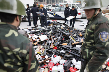 13,000 illegal firearms destroyed in Shanghai