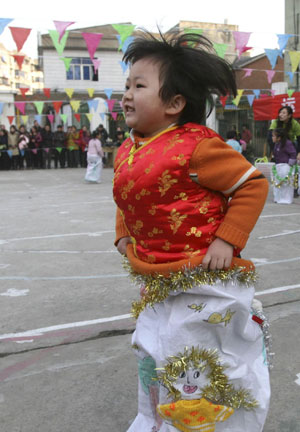Children greet new year with sports meeting