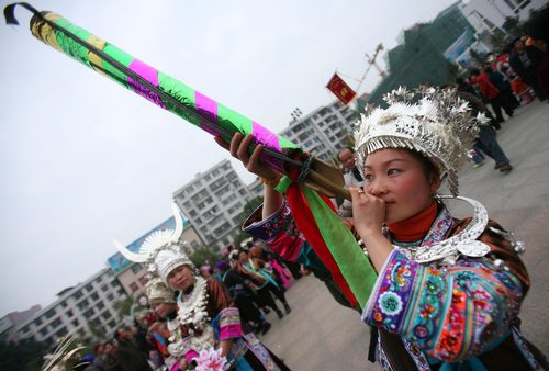 Miao dance to celebrate new year
