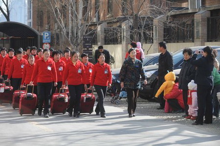 Nannies arrive in Beijing to relieve shortage