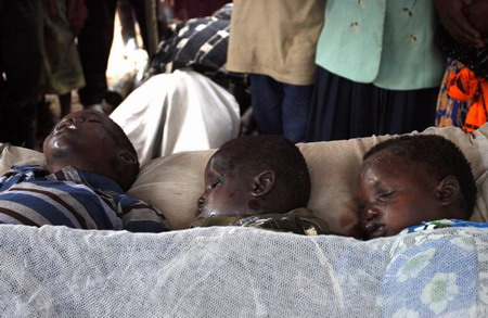 Ugandans search for the missing due to landslide