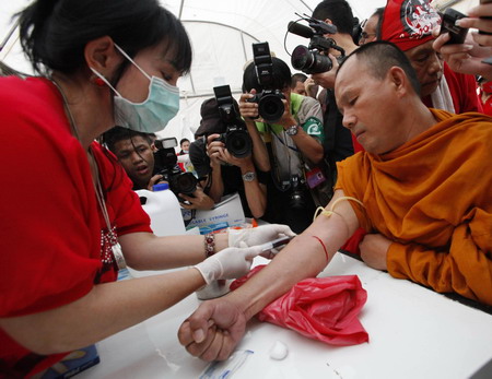 Pouring human blood to protest in Bangkok