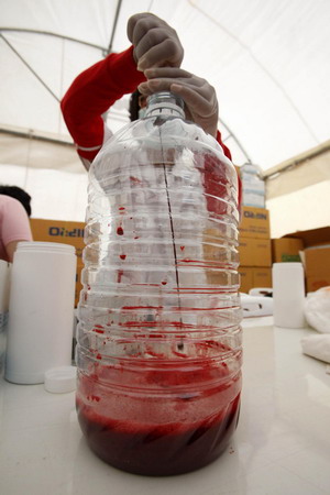 Pouring human blood to protest in Bangkok