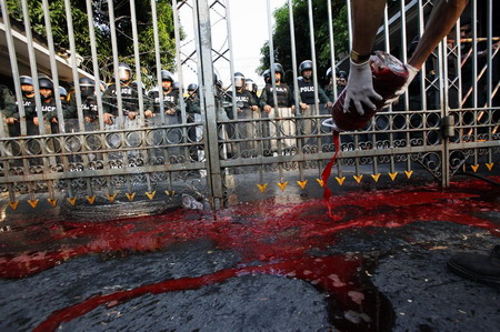 Pouring human blood to protest in Bangkok