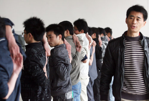 Push-up tests on job fair in Wuhan