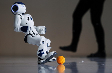 Robots play soccer in scotland
