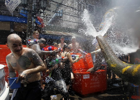 People celebrate Water-splashing Day in Thailand
