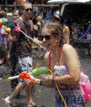 People celebrate Water-splashing Day in Thailand