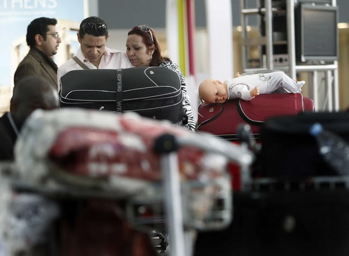 Stranded passengers wait at major Europe airports