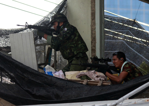 Thai PM vows to push through army operations