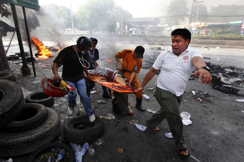 Thai PM vows to push through army operations