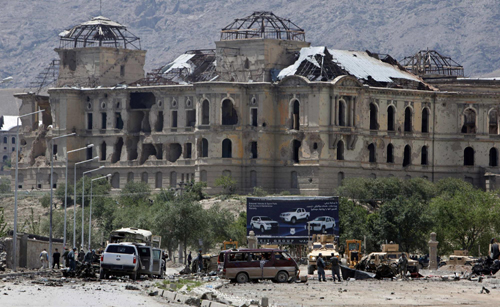 Taliban suicide bomb hits NATO convoy, kills 18