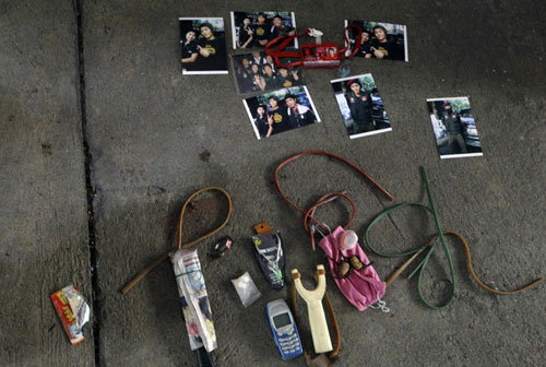 Bangkok burns as protesters surrender