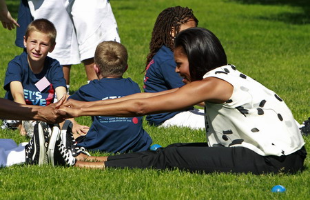 US first lady plays with children to promote physical activity