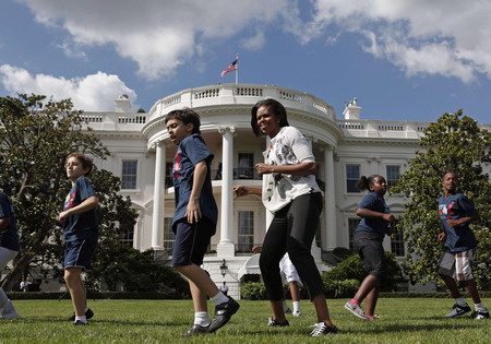 US first lady plays with children to promote physical activity