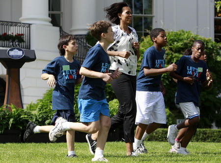 US first lady plays with children to promote physical activity
