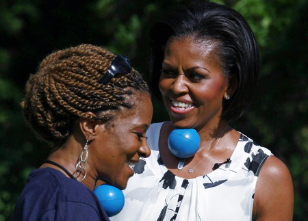US first lady plays with children to promote physical activity
