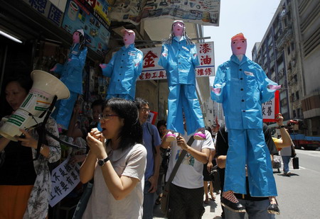 Workers' rights groups protest Foxconn in HK