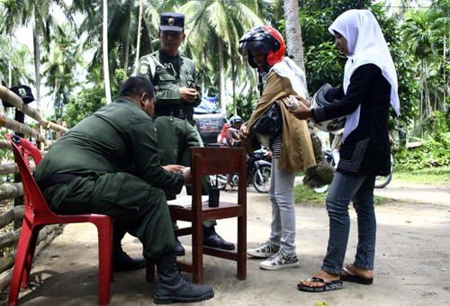 Women caught wearing tight pants given skirt in Aceh